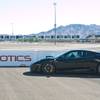 High performance sports cars make their way on and off the track through out the day at Exotics Racing Las Vegas, Thursday Oct. 25, 2012.